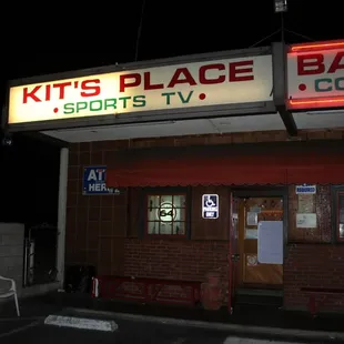 a neon sign for a sports bar