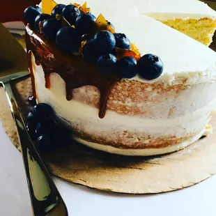 a cake with blueberries on top