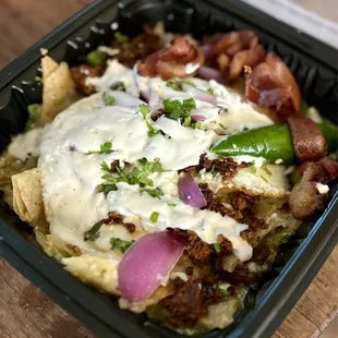 Kitsch&apos;n Chilaquiles with Bacon and Chorizo