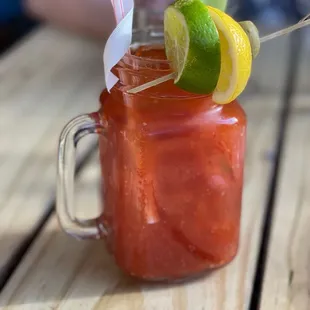 a bloody drink in a mason jar
