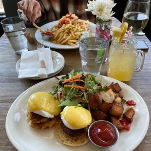 Captain Swizzle and crab cake Benedict. Sauvignon blanc and lobster roll in the back!