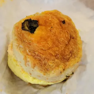 Breakfast sandwich on cheddar jalapeno biscuit