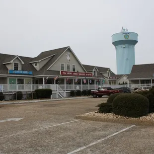 Our stores are located immediately South of the Water Tower in Duck