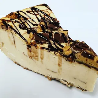 Reese's Peanut Butter Cups Cheesecake Slice
