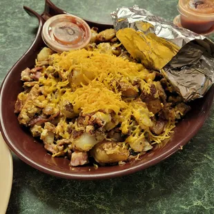 Meat scrambler, looks good, serves with hot flour tortillas