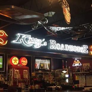 an airplane flying over the bar