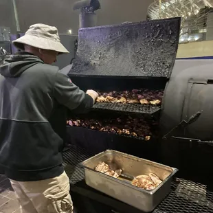 The owner Billy smoking meat everyday.