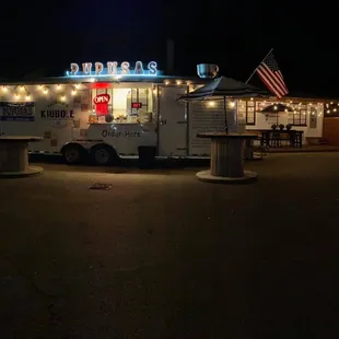 the exterior of a restaurant at night