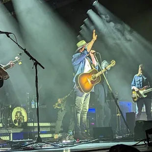 a band performing on stage