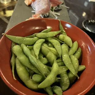 Edamame with sashimi ($21) in the background