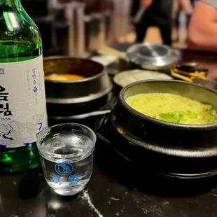 Chum Churum Original Soju with the tofu soup and steamed egg in the background.
