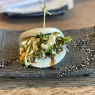 a close up of a bun on a plate