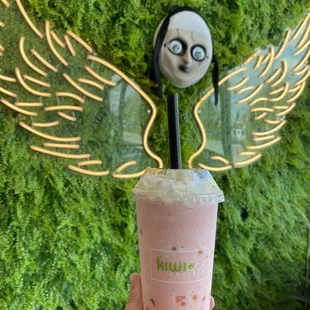 Frozen strawberry yogurt with mango popping boba