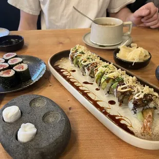 Dragon roll, spicy tuna roll, miso soup.