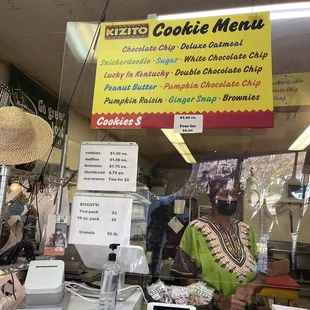 a woman behind the counter