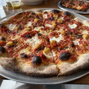 Make your own pizza with red bell peppers, roasted pineapple and caramelized onions on a sourdough crust.