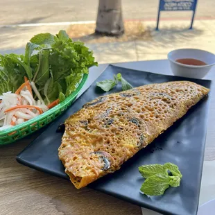 Banh Xeo (I did it vegetarian; mushrooms, bean sprouts &amp; onions inside) $12.99