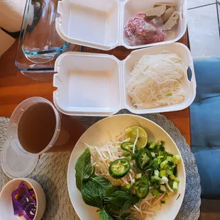 Ordered Pho with raw beef and meatballs. It was really good. The veggies were very fresh. Good portion size.