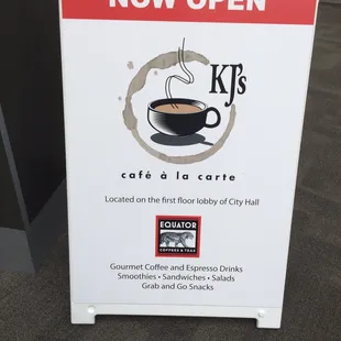 a sign for kj's cafe