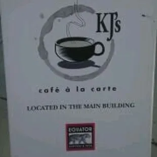 a sign for kj's coffee