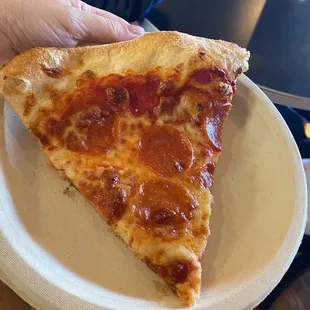 a slice of pepperoni pizza