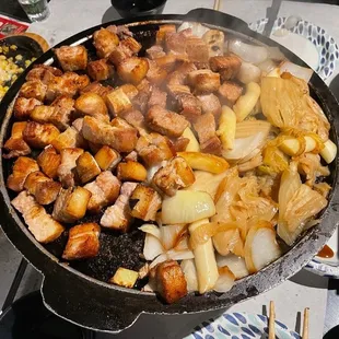 a variety of foods being cooked