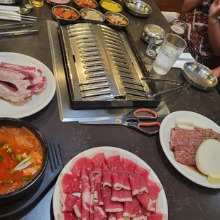 Brisket, pork belly, marinated beef