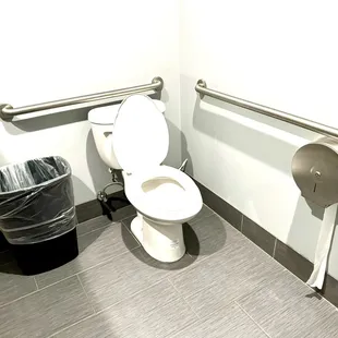 a toilet in a public restroom