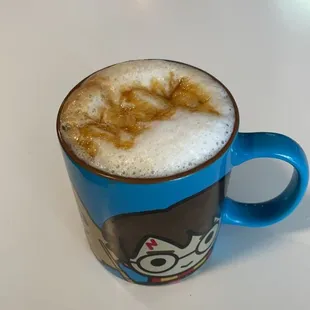 Carmel Macadamia latte in a ceramic mug