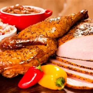 a roast pork with a side of coleslaw