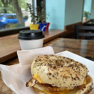 bagel with egg cheese and bacon and a Mocha