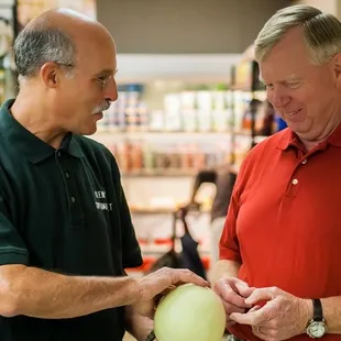 two men in a grocery store