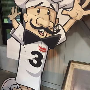 a man in a chef's hat