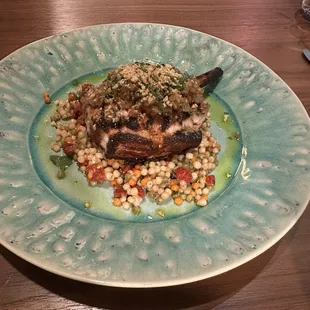 MORROCAN PORK CHOP spiced sofrito, sundried tomato couscous