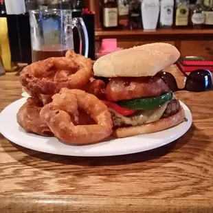 a burger and onion rings