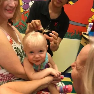 Natalia working her magic at Baby's First Haircut