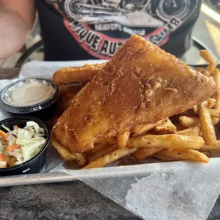 &quot;Fish &apos;n chips&quot; should be removed from menu: tasted like frozen filets deep fried in old oil with condiment-cup side of slaw.