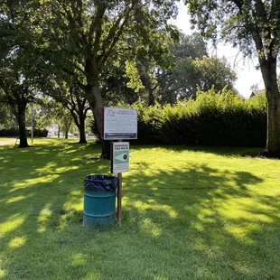 Very efficient signs and trash cans!