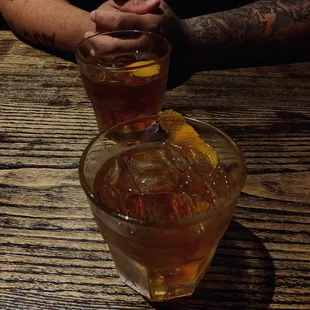 a person holding a drink