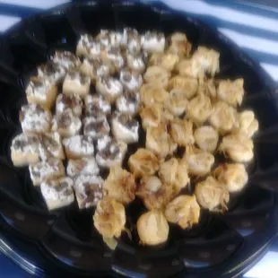 Mini caramelized onion tartlets and mini goat cheese tartlets.