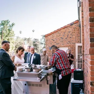 Guillermo makes us our own special quesadillas.