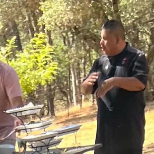 Friendly man providing the most delicious food.