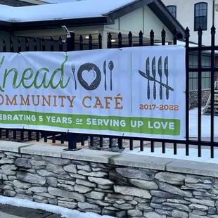 a sign for knead community cafe