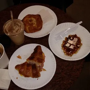 two plates of pastries and a cup of coffee