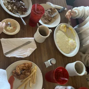 Chicken fingers, cube steak and gravy over rice, and pork chop and grits.