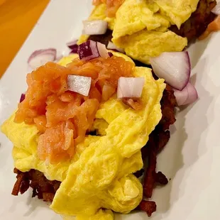 Loaded Latkes - Latkes, scrambled eggs, nova lox, red onion, sour cream.
