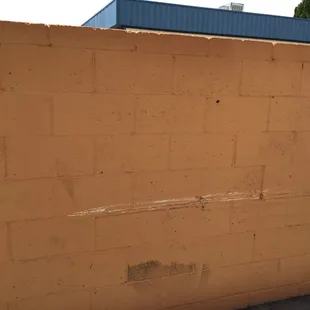 This is where the car was dragged against the wall, looks like a tire mark as well !