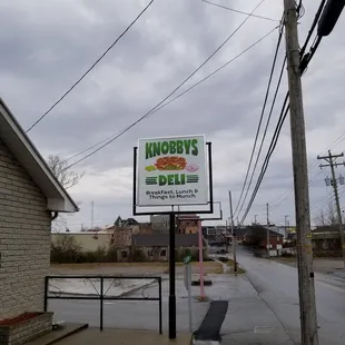 a sign for a deli