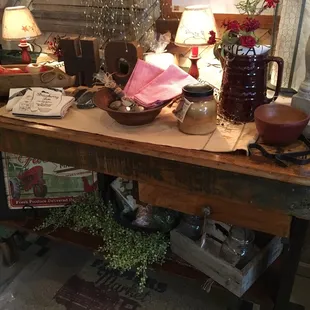  wooden table with various items on it