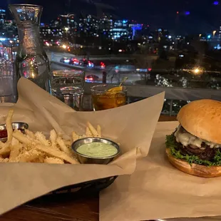 Basket of Garlic Parmesan Fries, The Knockabout Burger, and city views